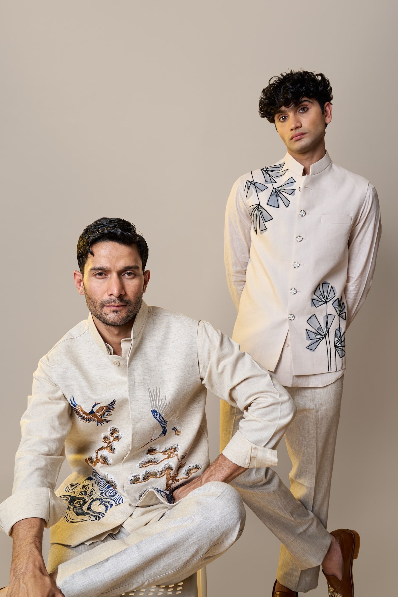 Ivory Geometric Bloom kurta with Nehru jacket and tailored trousers, another view.